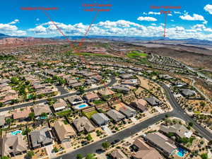 Aerial view of residential area featuring a mountain backdrop