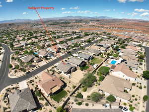 Aerial perspective of suburban area featuring mountains