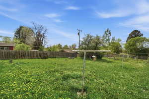 View of fenced backyard