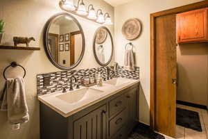 Main updated Bathroom includes pocket door that leads to main floor laundry area