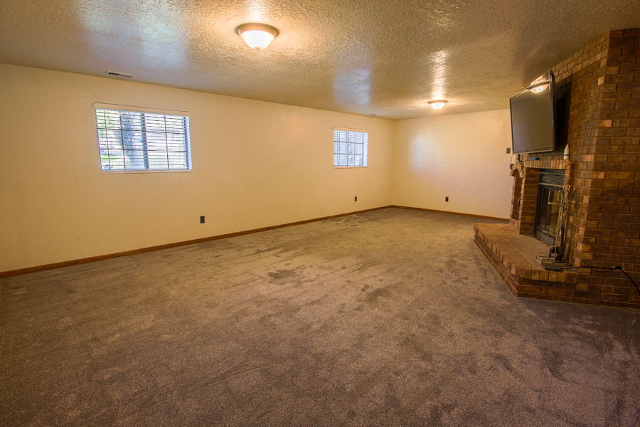 Downstairs is a great space for multigenerational living. Above ground windows with spacious rooms & egress