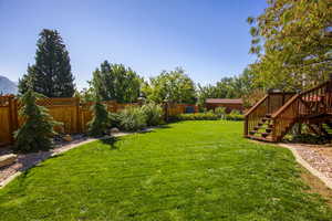 Fenced backyard. Lockable large gate on each side of house in front. Double gate to open area park & path behind