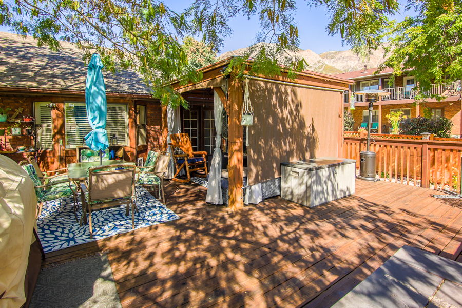 Deck is accessed thru Great room for additional social space. plumbed for gas BBQ or. Wide steps to backyard