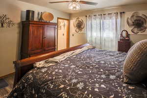 Primary Bedroom with ensuite bath. Big view windows with great light & ceiling fan