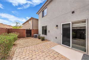 Fenced backyard featuring a patio area
