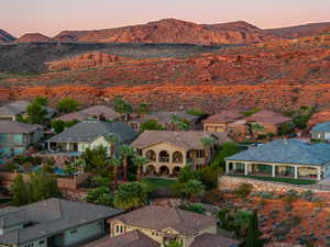 Aerial view at dusk of a residential view and a mountain view