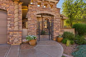 View of exterior entry featuring a gate