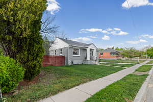 View of side of home featuring brick siding