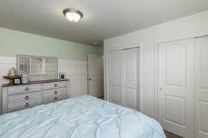 Bedroom with multiple closets