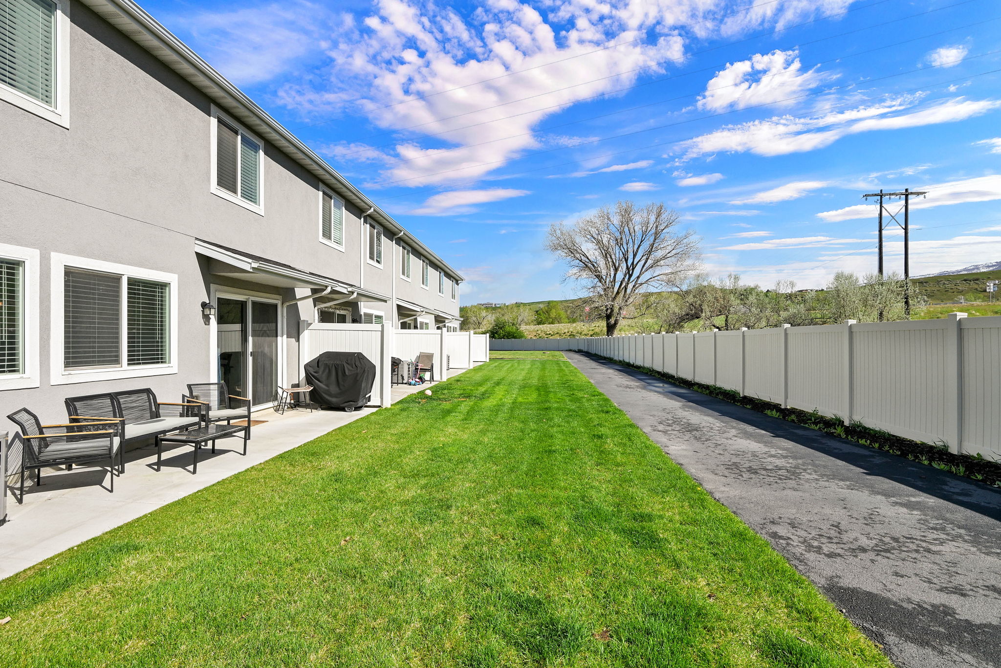 Fenced yard with a patio