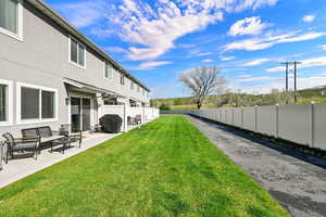 Fenced yard with a patio