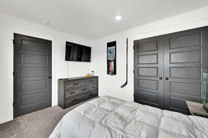 Bedroom featuring carpet