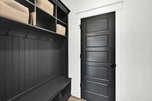 Mudroom featuring light wood-style flooring