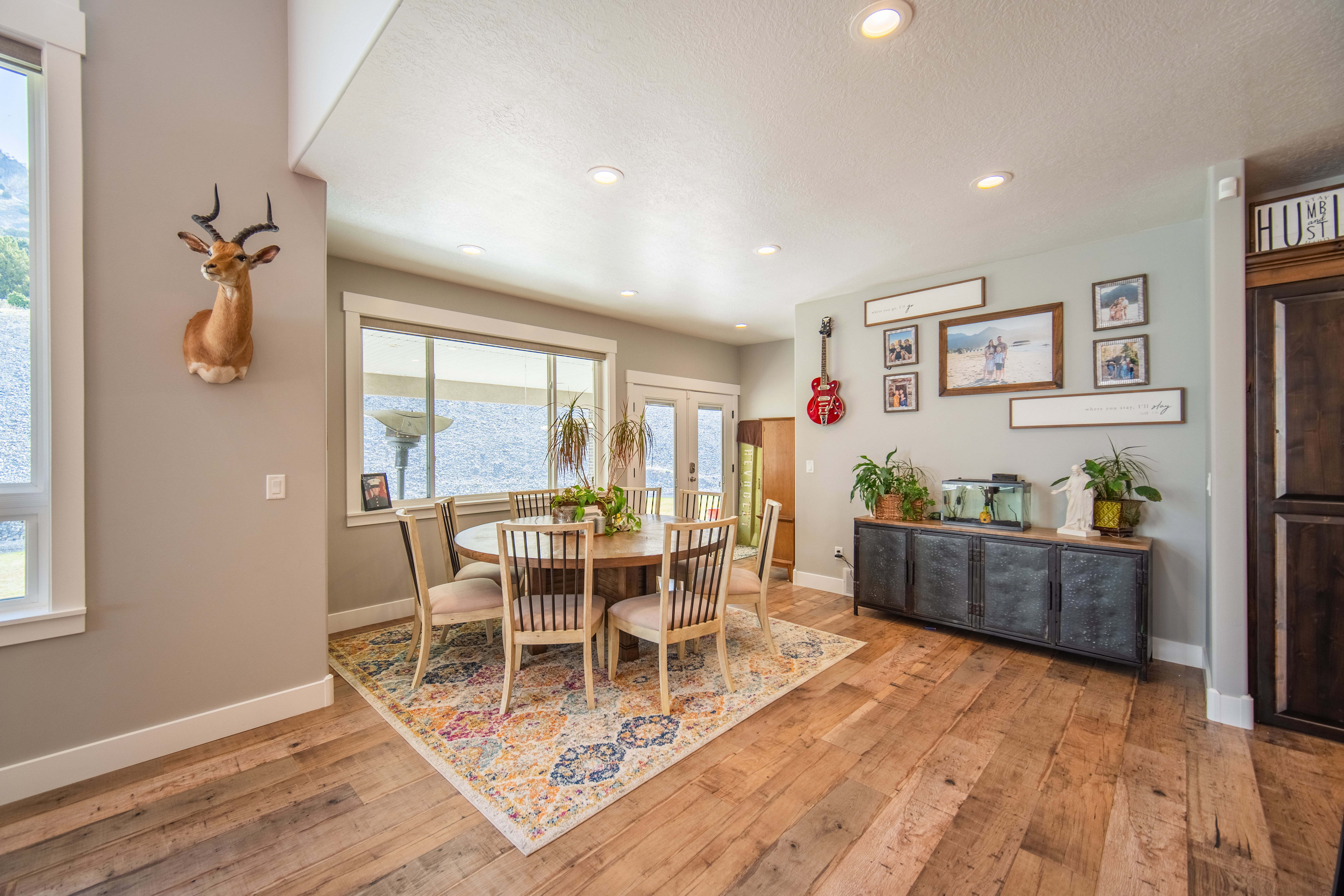 Dining area featuring recessed lighting, wood-style floors, and french doors