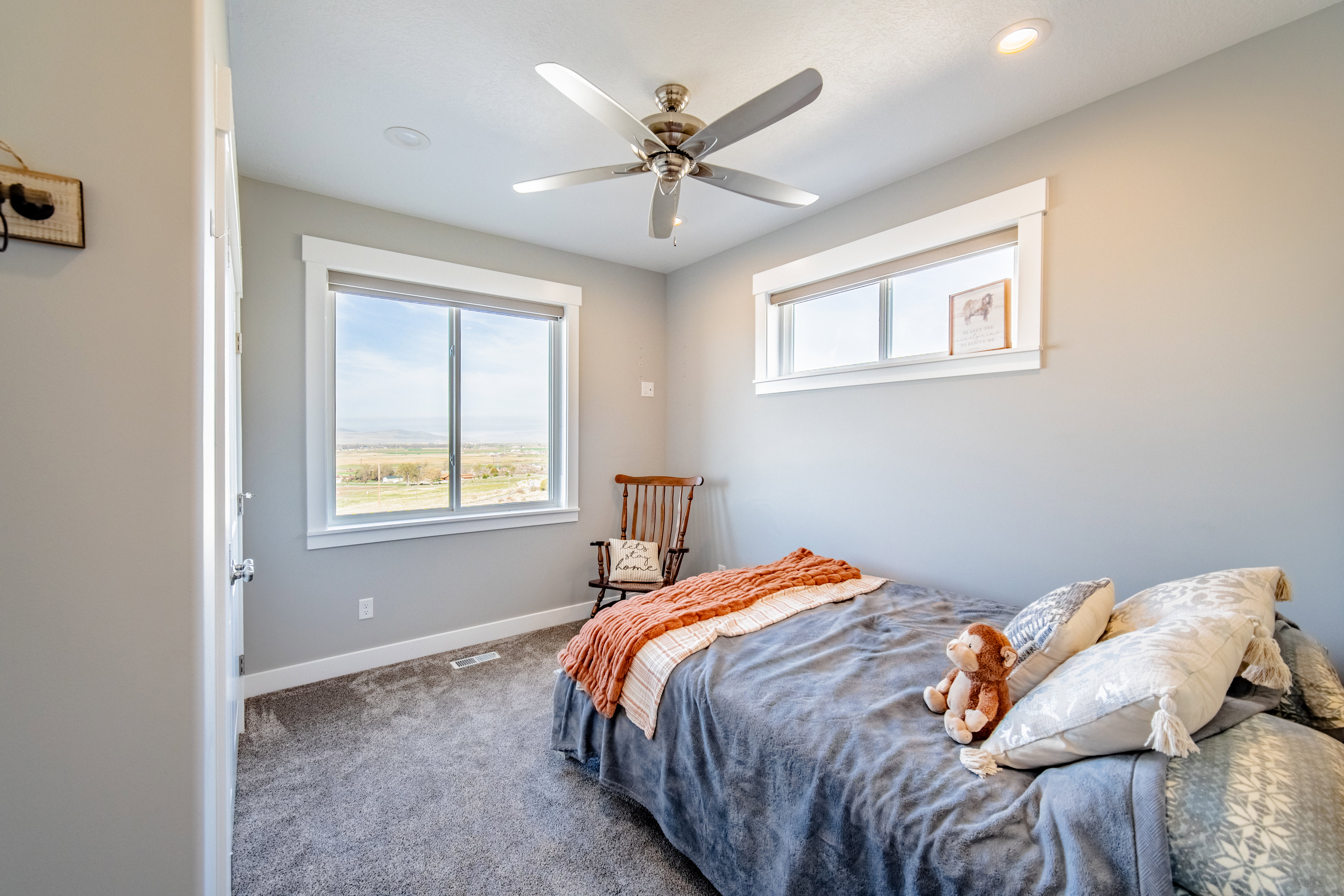 Bedroom with carpet and ceiling fan