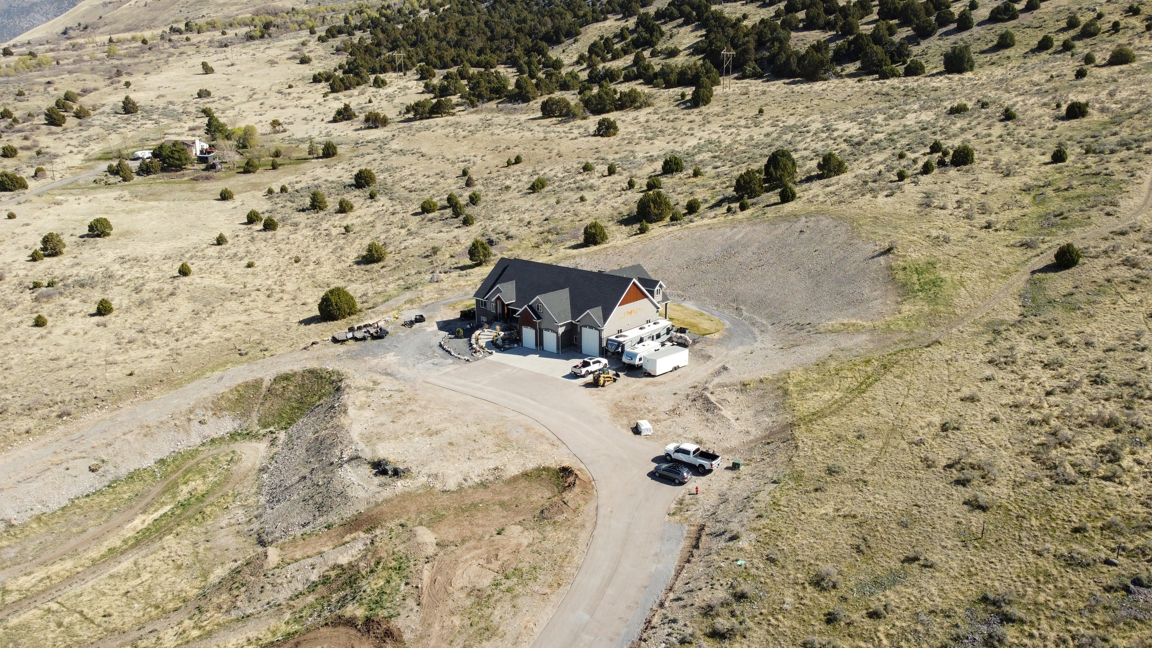 Aerial view of property and surrounding area featuring a desert landscape and rural landscape