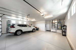 Garage with water heater and heating unit