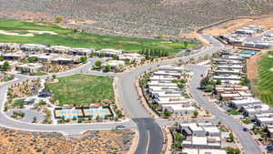 Aerial view of property's location with a golf course