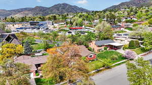 Aerial perspective of suburban area with mountains