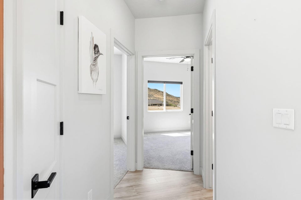 Hall with light wood-style flooring