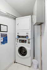 Laundry area with stacked washer / drying machine