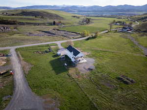 Aerial view of property and surrounding area with rural landscape and a pastoral area