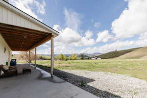 View of patio with a mountain view