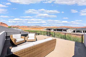 View of patio / terrace featuring a residential view, a mountain view, and outdoor lounge area