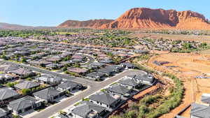 Aerial view of residential area featuring a mountain backdrop