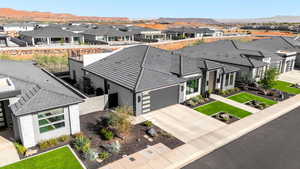 Aerial view of residential area featuring mountains