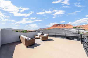 View of patio / terrace with a mountain view