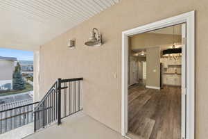 Doorway to property with stucco siding