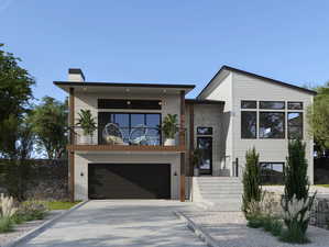Contemporary home with a balcony, a chimney, a garage, and driveway
