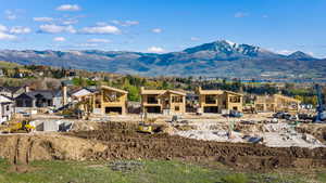 View of mountain background featuring nearby suburban area