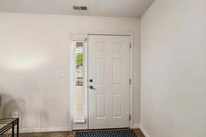 Entryway featuring baseboards