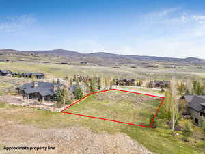 View of property location with property boundaries highlighted and mountains