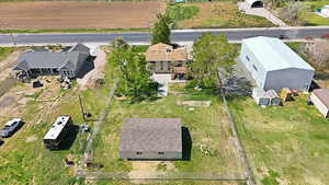 View of rural area featuring rows of crops