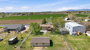 Aerial view of residential area featuring a mountain backdrop