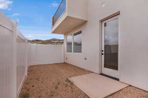 Fenced yard featuring a patio