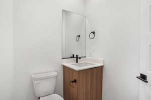 Bathroom with vanity and toilet