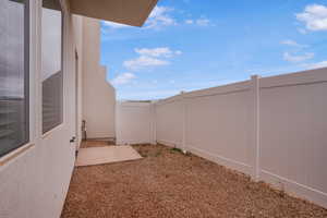 Fenced yard with a patio area