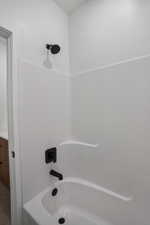 Full bathroom with shower / bathtub combination