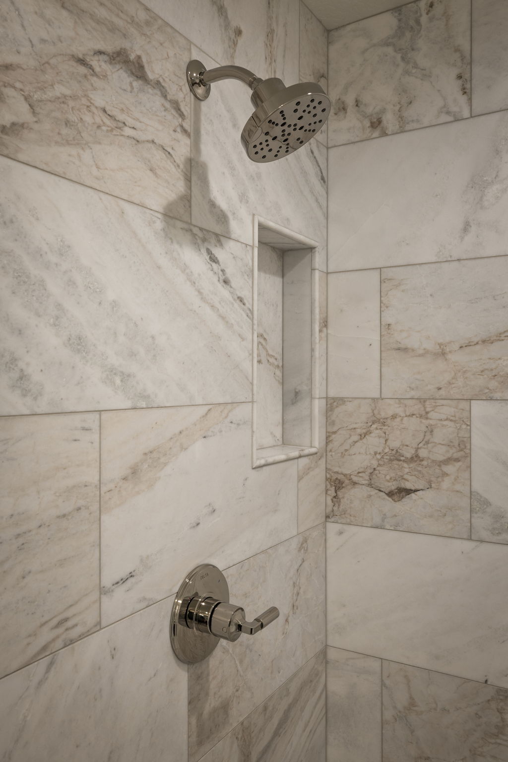 Pictures of an exterior unit -Bathroom view of tiled shower