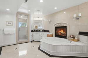 Primary bathroom with new Calcutta marble & fluted details