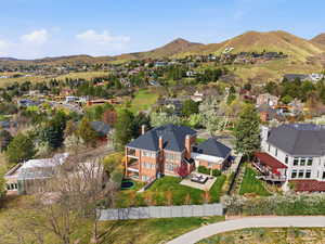 Aerial perspective of the home in Federal Heights (and the iconic U on the mountain)