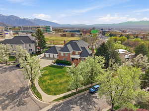 Aerial view of cul-de-sac and University of Utah, mountain backdrop