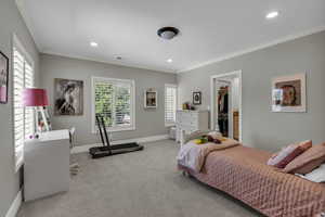 Spacious bedroom with a walk-in closet and private ensuite bathroom