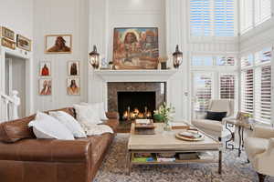 Great room/Family room with two-story windows and views