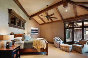 Carpeted bedroom with lofted ceiling, a ceiling fan, and recessed lighting