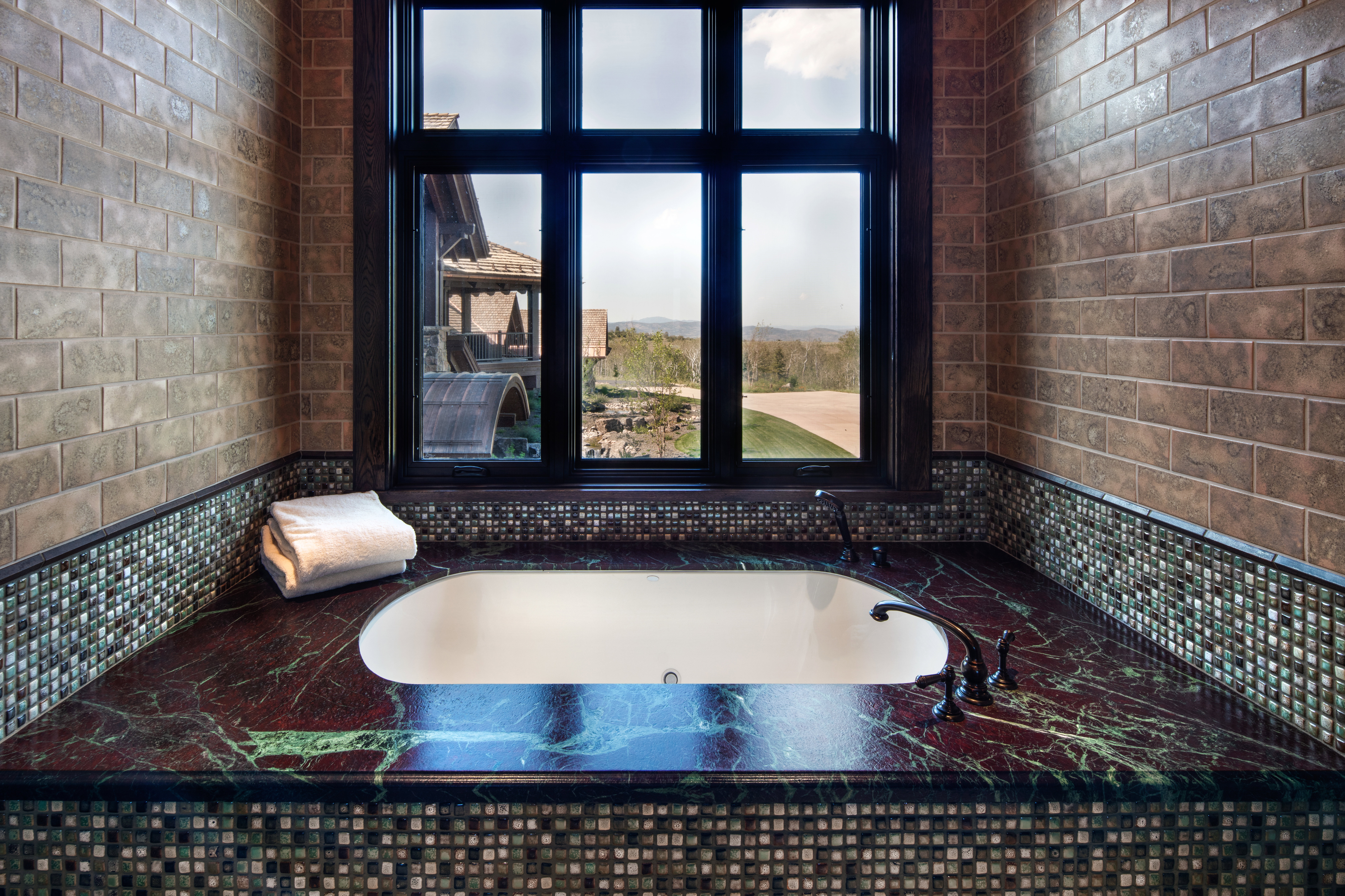 Full bathroom featuring a garden tub